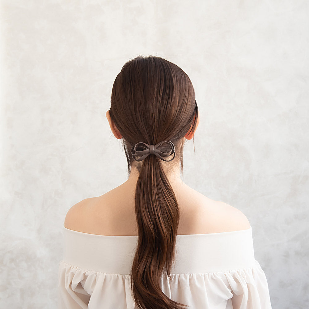 Faux Leather Bow Pony Hook