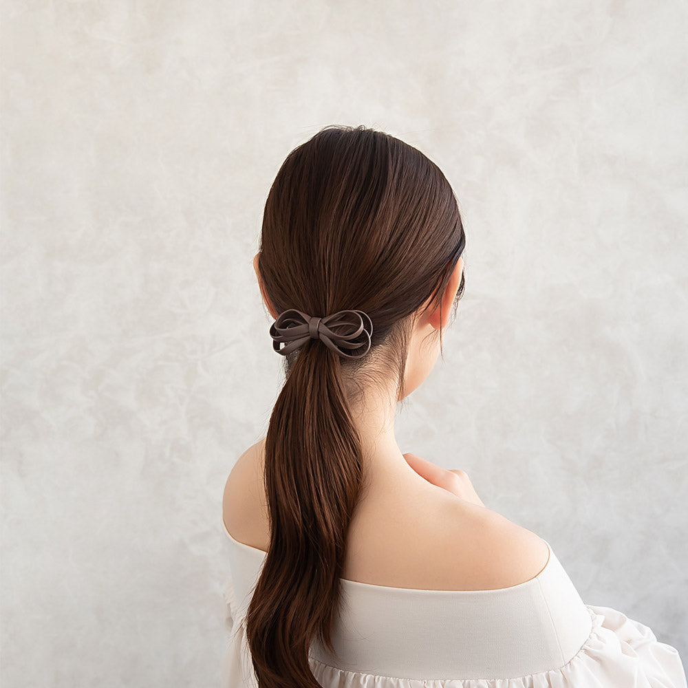 Faux Leather Bow Pony Hook