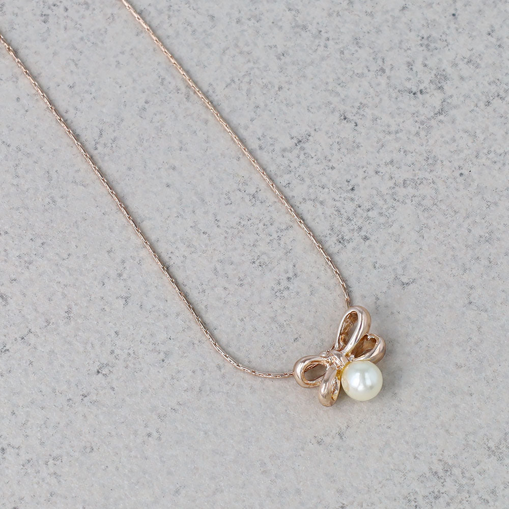 Rose Silver Tone Bow and Pearl Slider Necklace
