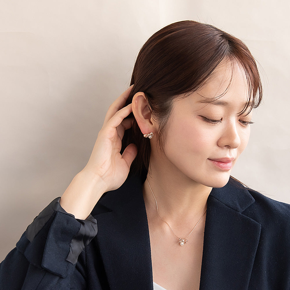 Rose Silver Tone Bow and Pearl Earrings